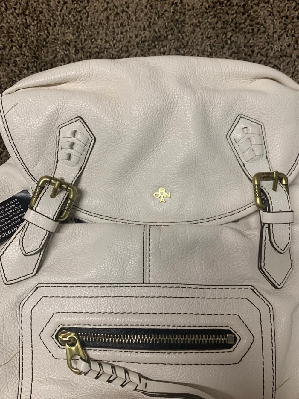 orYANY White Leather Backpack with Front Zip Pocket and Buckle Detail - Picture 2 of 9